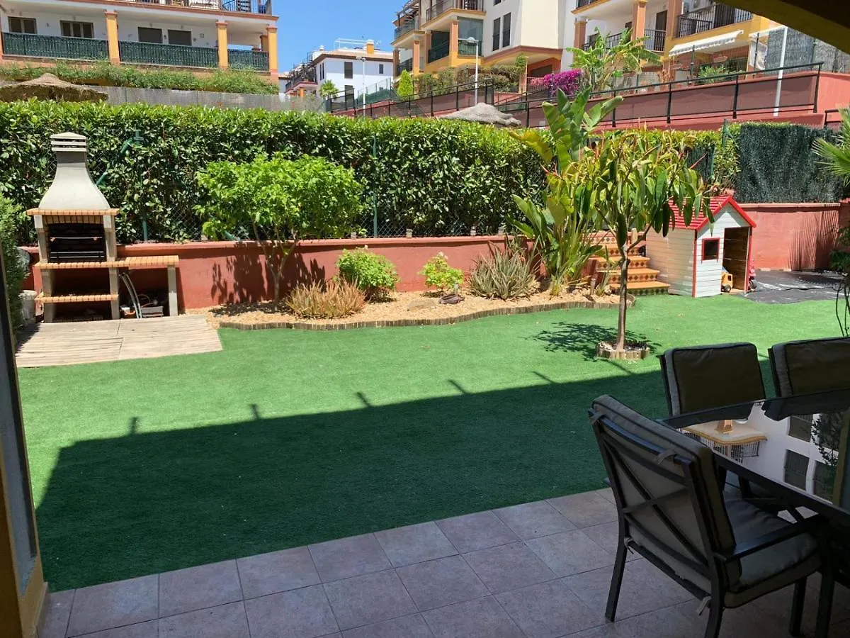 Apartamento con jardín privado y acceso a piscina Huelva España