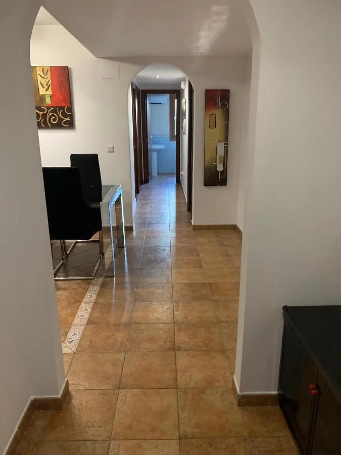 Apartamento con jardín privado y acceso a piscina Huelva