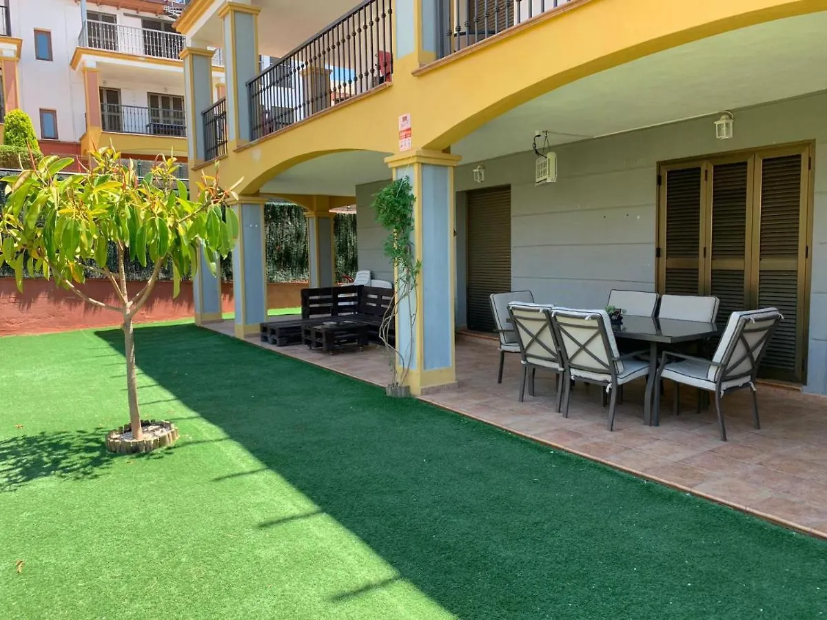 Apartamento con jardín privado y acceso a piscina Huelva 0*,  España