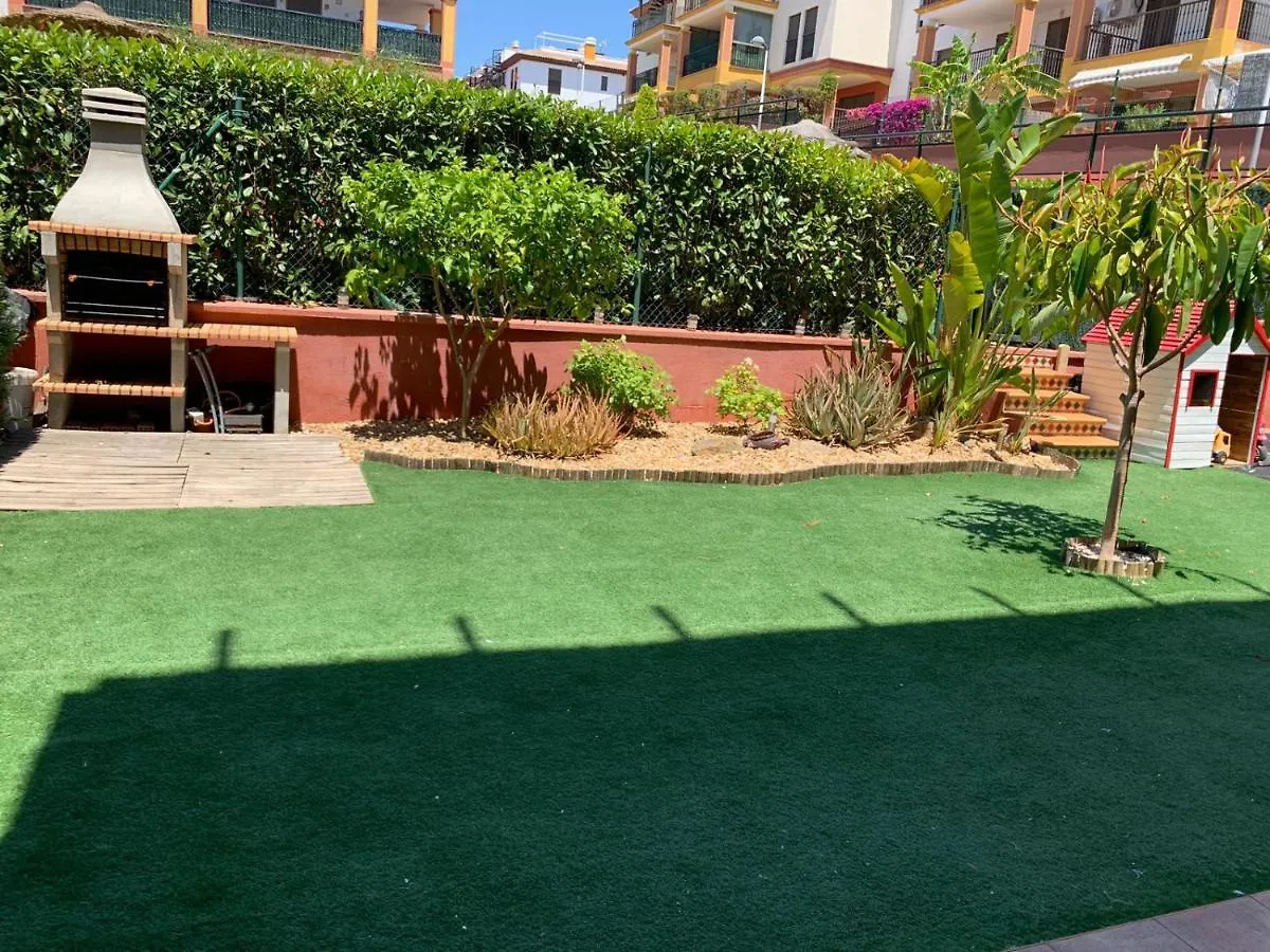 Apartamento con jardín privado y acceso a piscina Huelva España