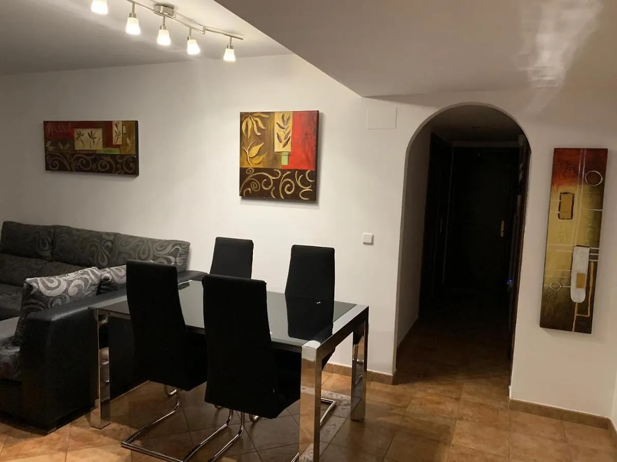 Apartamento con jardín privado y acceso a piscina Huelva