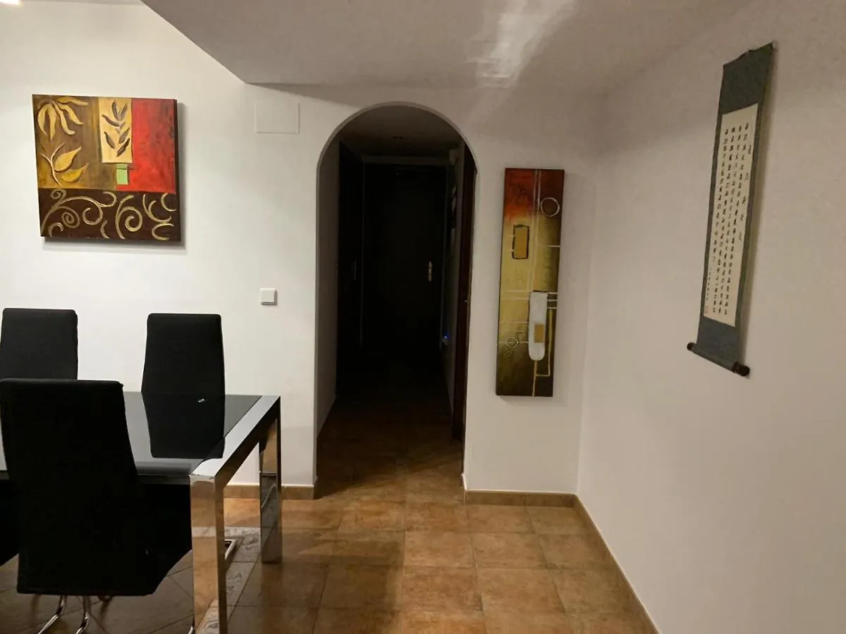 Apartamento con jardín privado y acceso a piscina Huelva